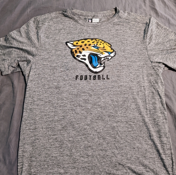 NFL Team Apparel - TX3 Cool - Jacksonville Jaguars Football Tee. - Picture 1 of 2